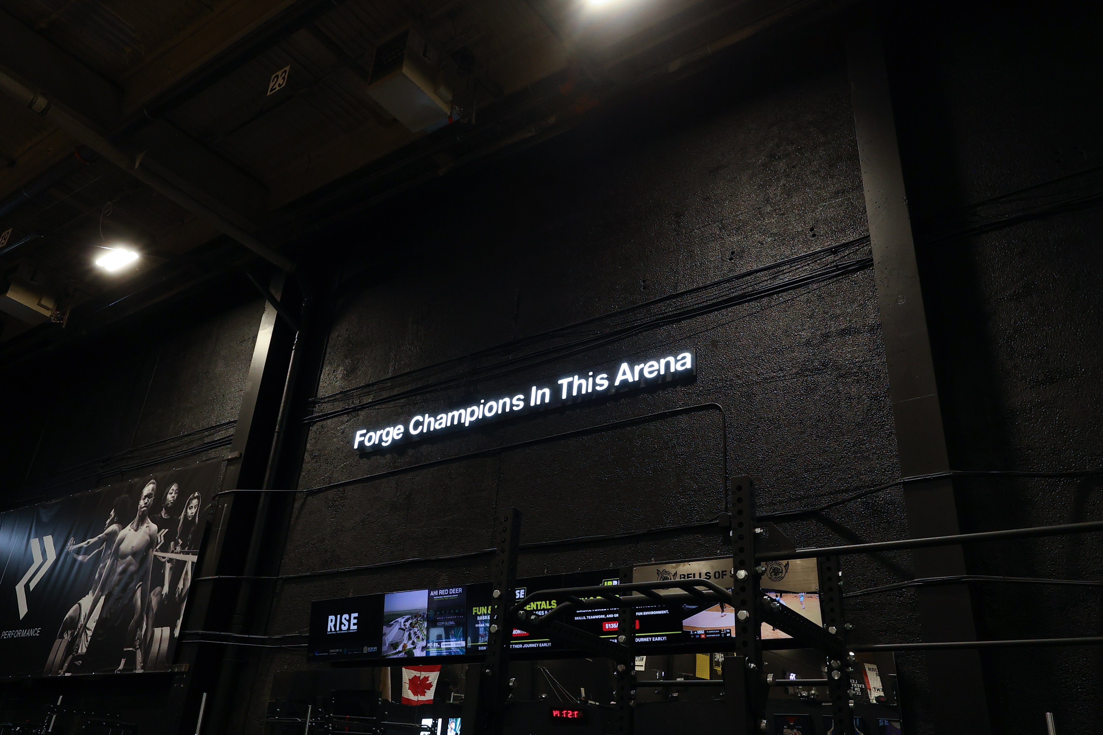 Calgary-based strength zone with squat racks and barbells
